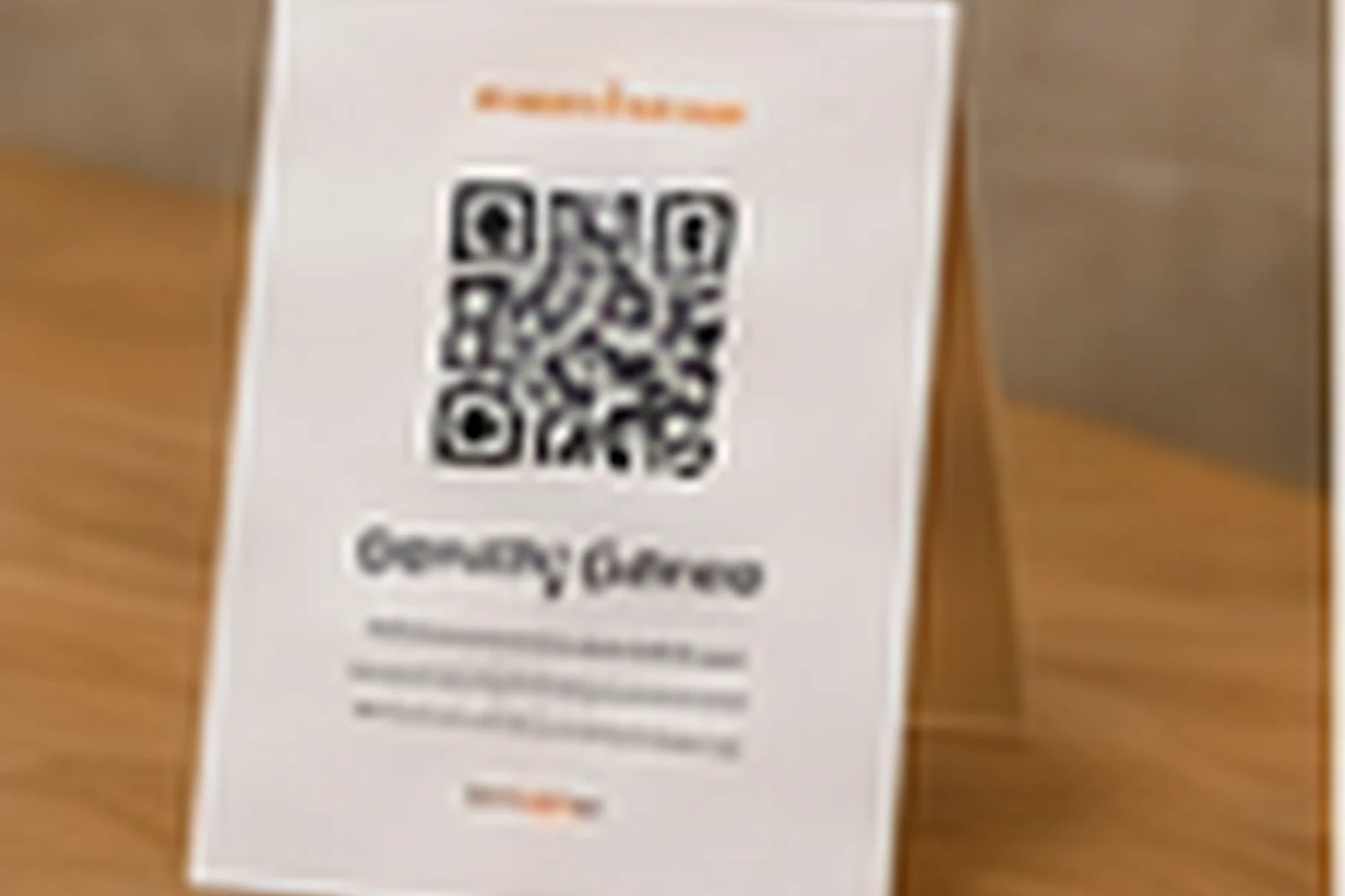 Clean QR guest guide card in a short-term rental apartment